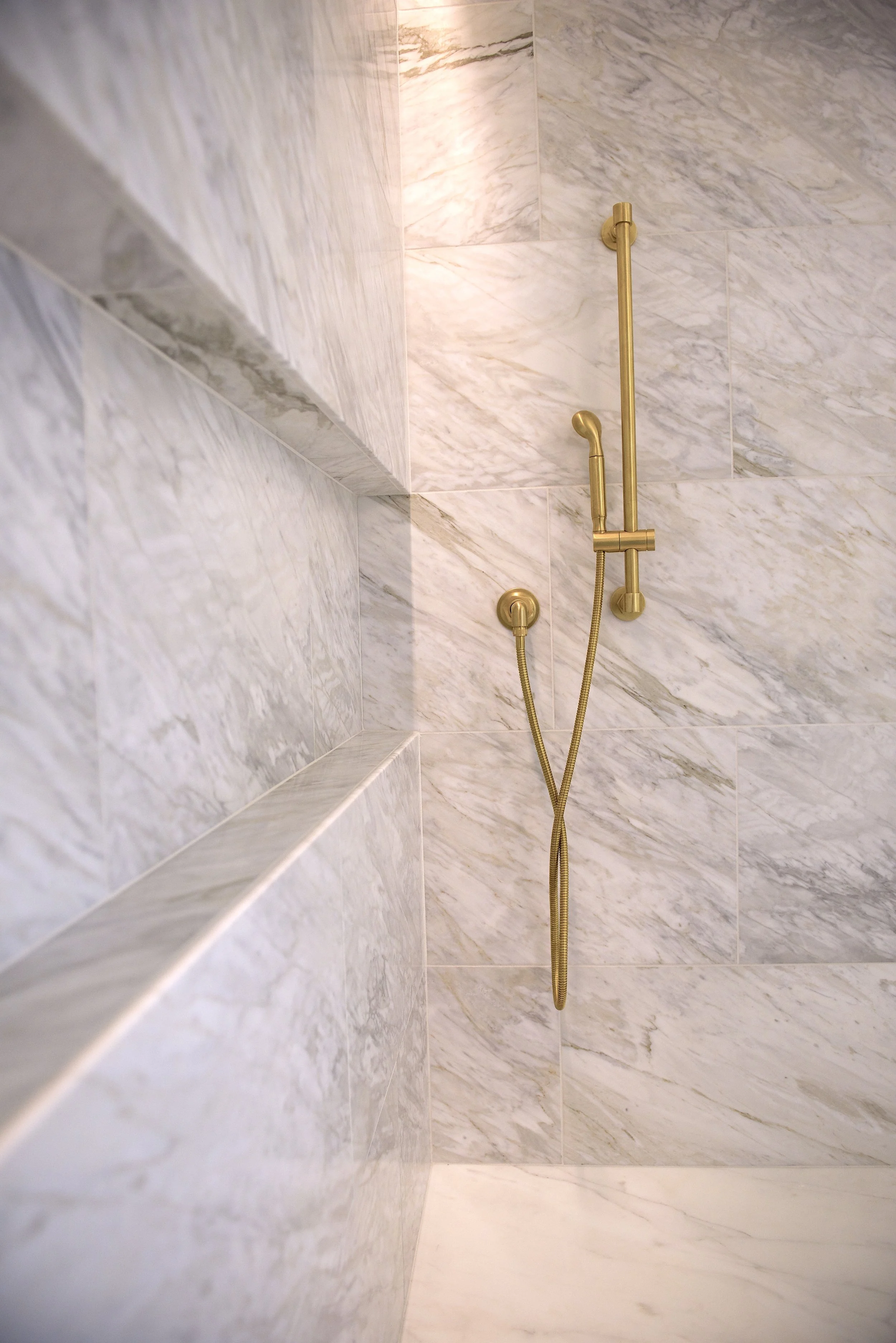 Custom shower tile with gold hardware, Austin